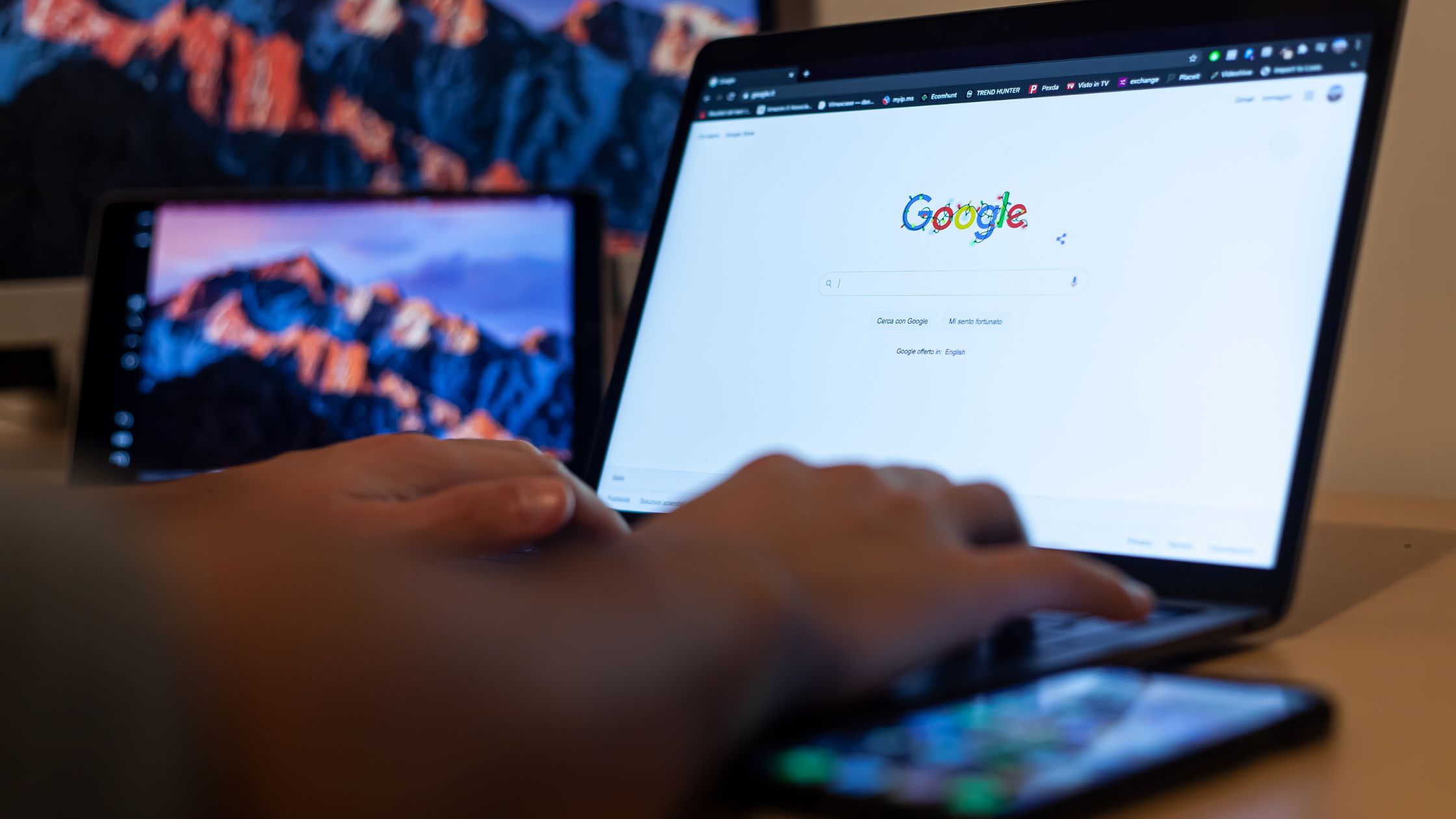 Man using Google on laptop